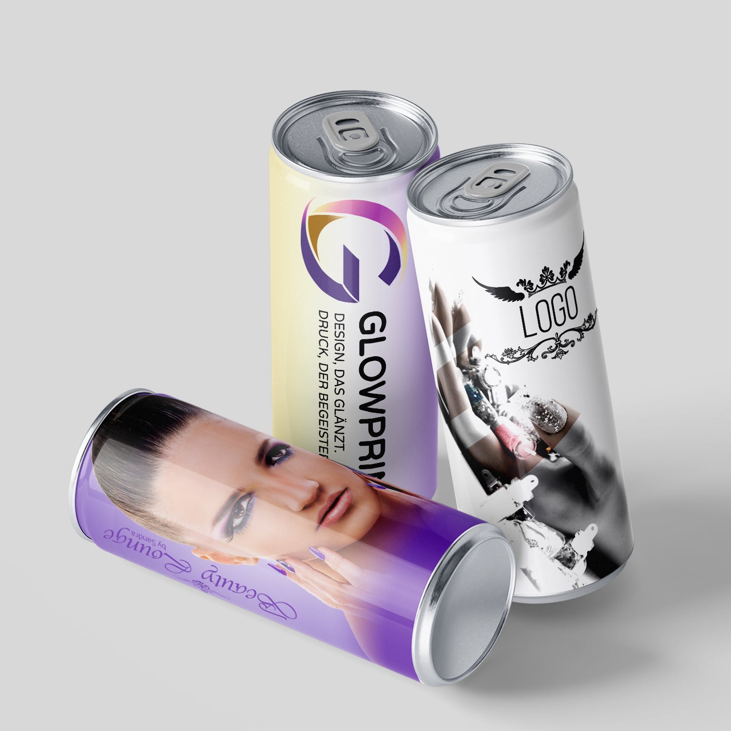 Drei bedruckte Energy-Getränkedosen mit eigenem Design