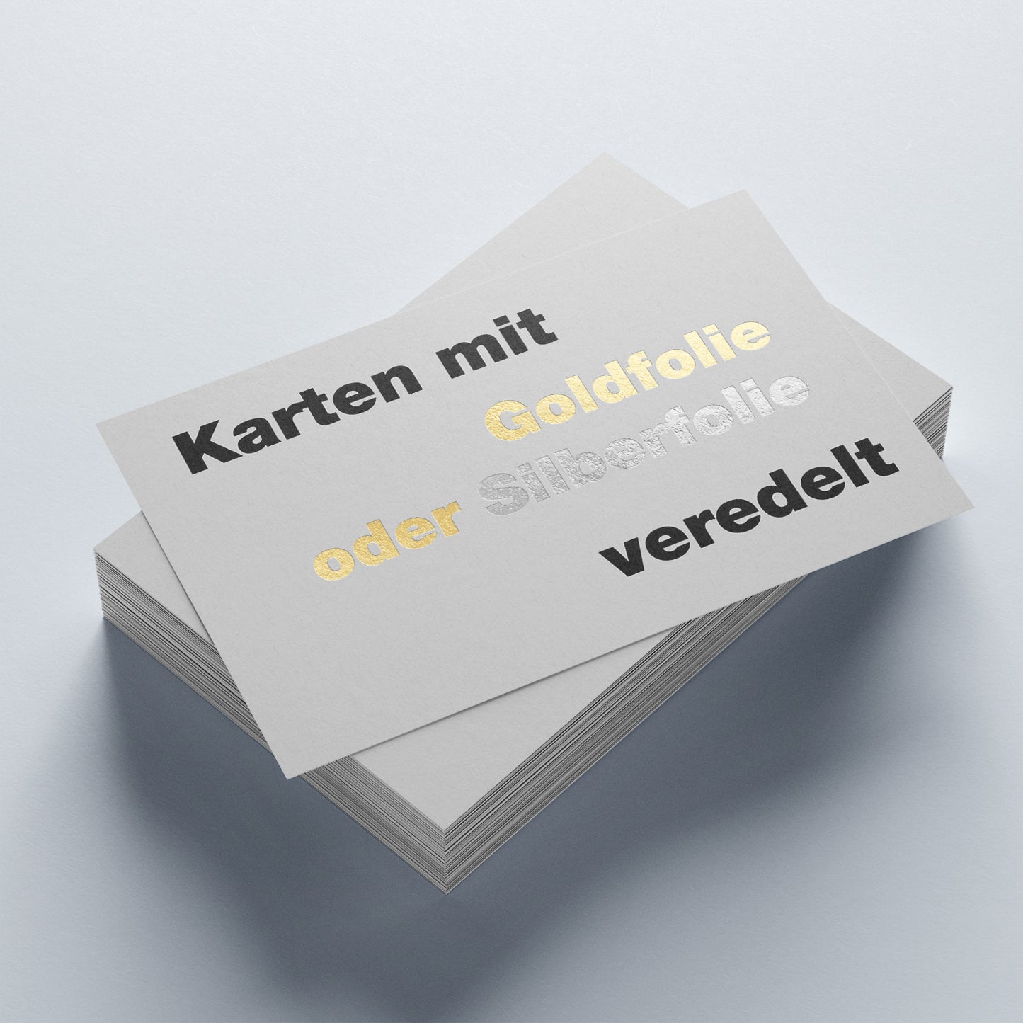 Visitenkarten mit Gold- und Silberfolierung veredelt