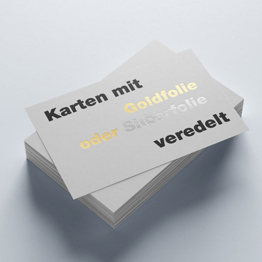 Visitenkarten mit Gold- und Silberfolierung veredelt